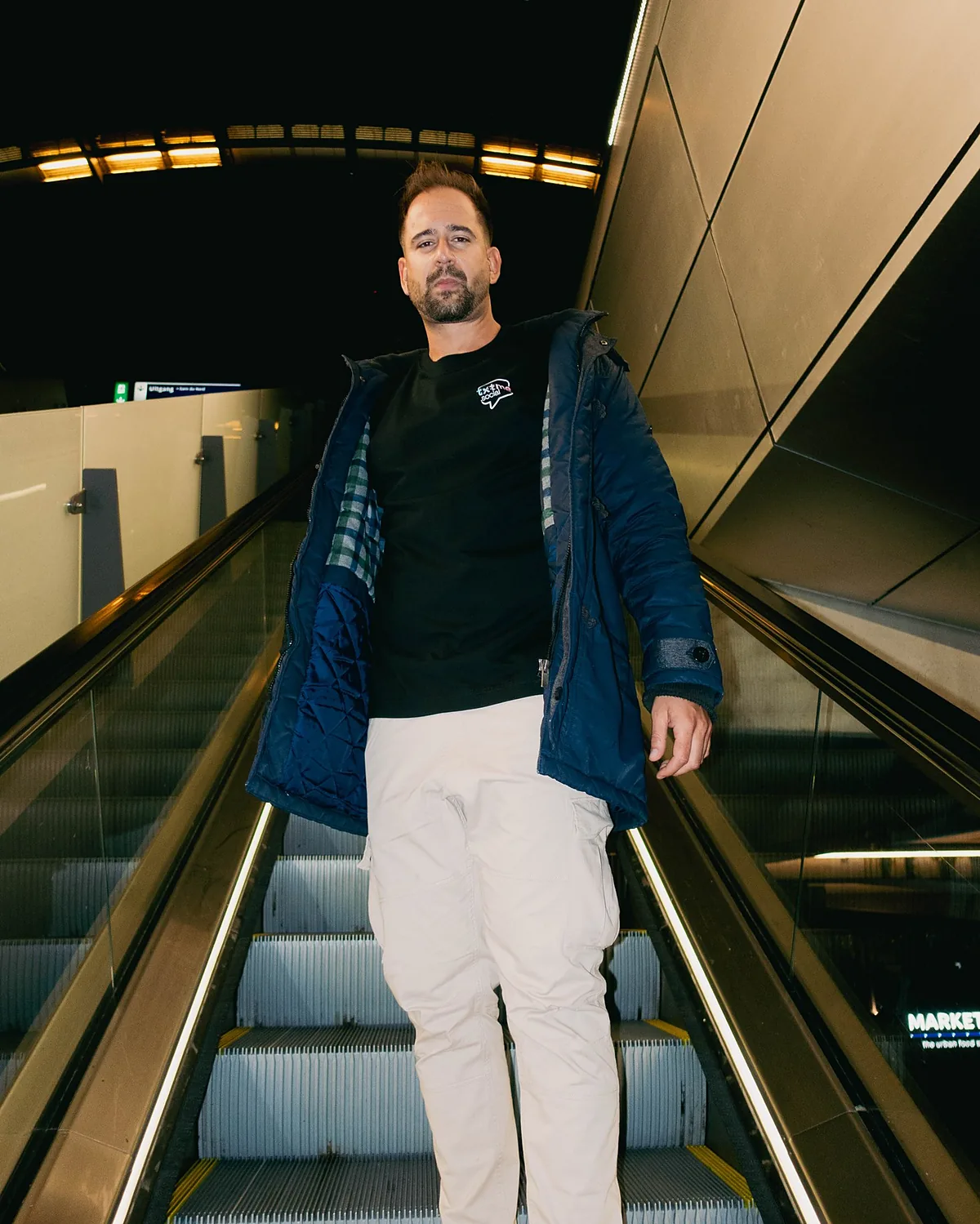 On the escalator, on the way out