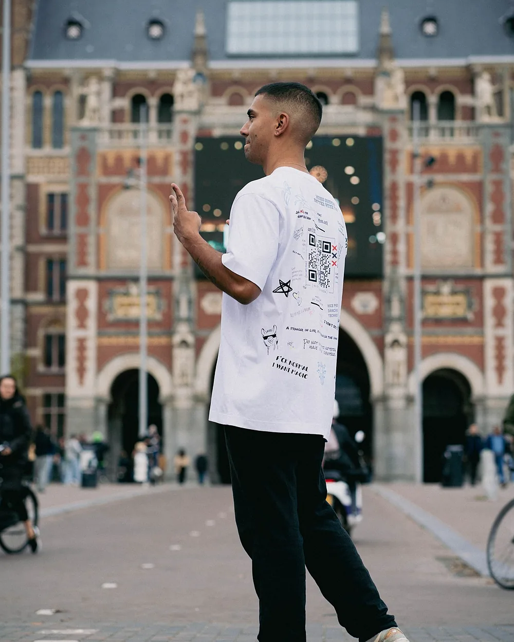 The white txtme.social shirt in front of the Rijksmuseum, Amsterdam