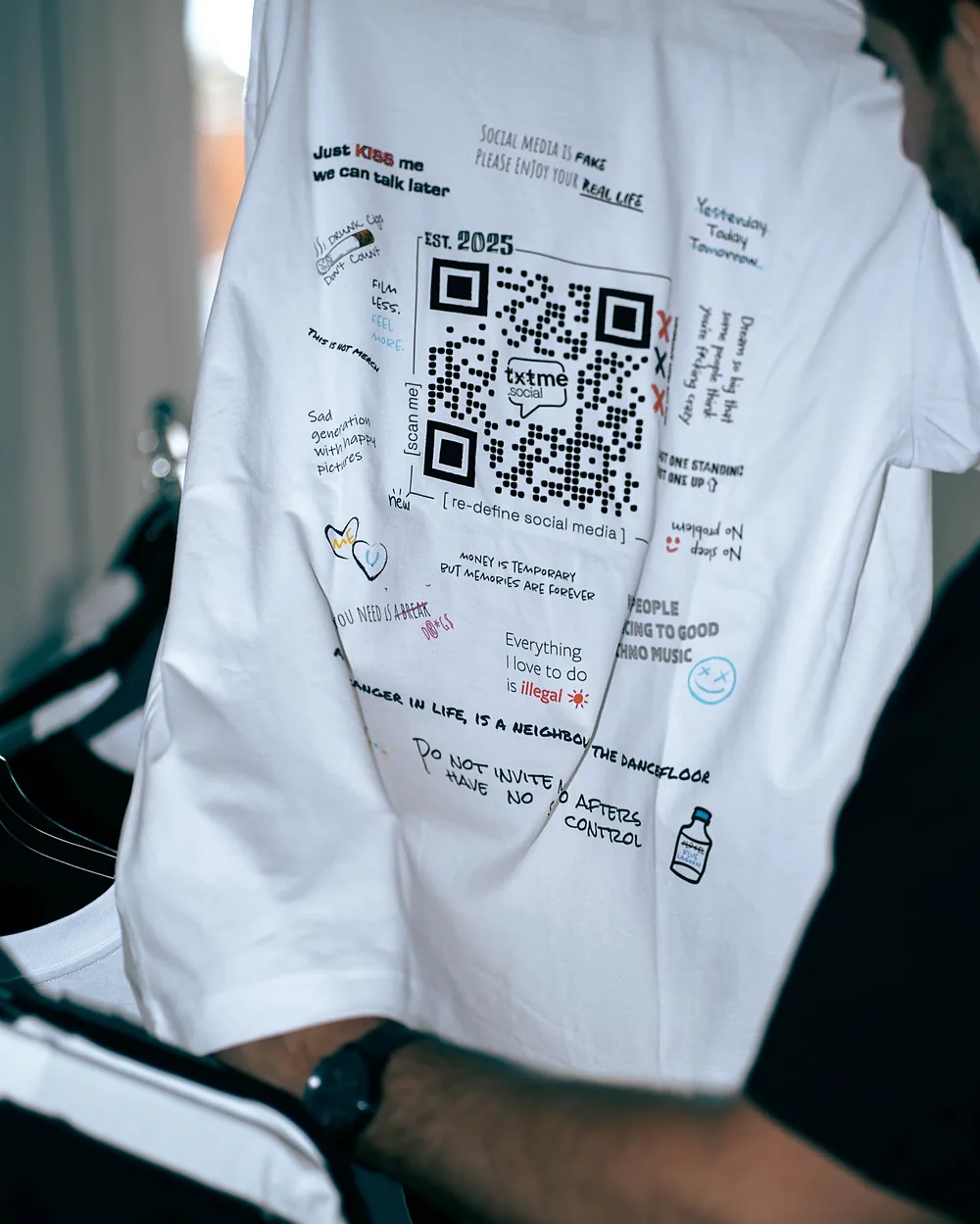 The back of the white edition on a hanger, the printed code